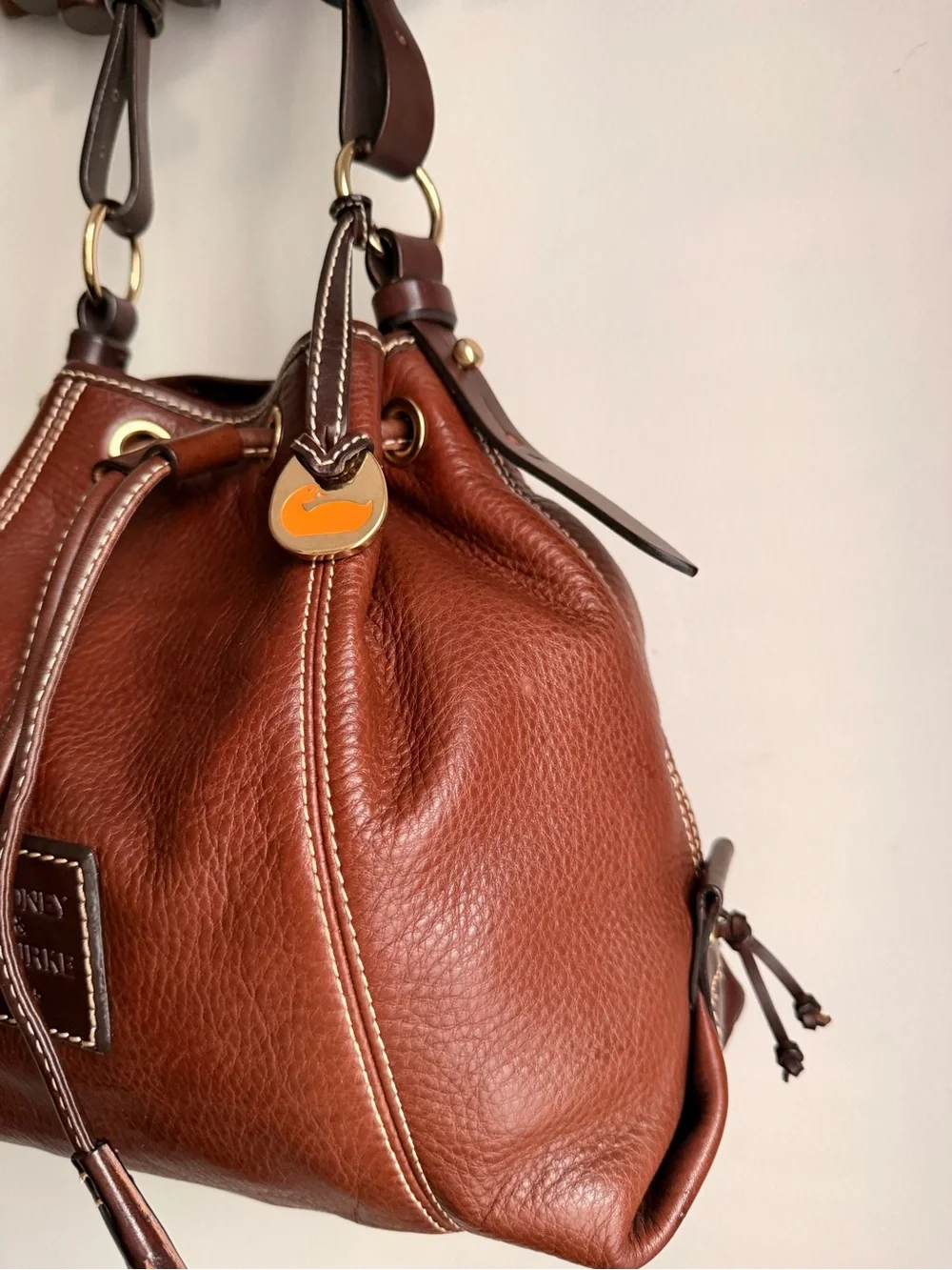 Dooney & Bourke Brown Pebbled Leather Drawstring Shoulder Bag